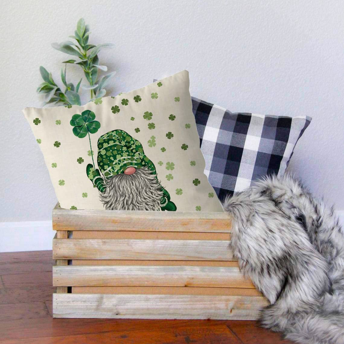 St. Patrick's Day pillow cover with a gnome holding a shamrock, surrounded by smaller shamrocks.