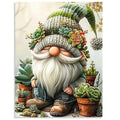 Stamped cross stitch pattern of a gnome surrounded by succulents, wearing a knitted hat adorned with plants.