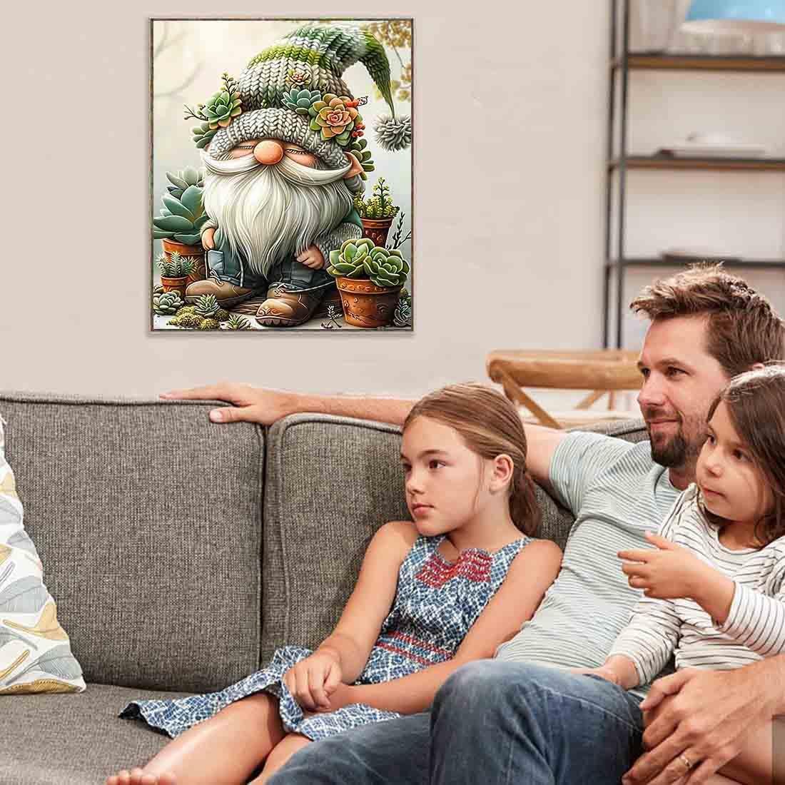 Family watching a framed cross stitch art of a gnome with succulents on a wall above a sofa