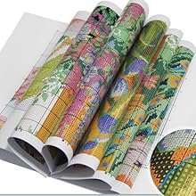 Rolled stamped cross stitch fabric patterns with close-up detail inset