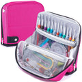 Pink crochet hook case open showing 26 slots filled with various sizes of crochet hooks and accessories inside.