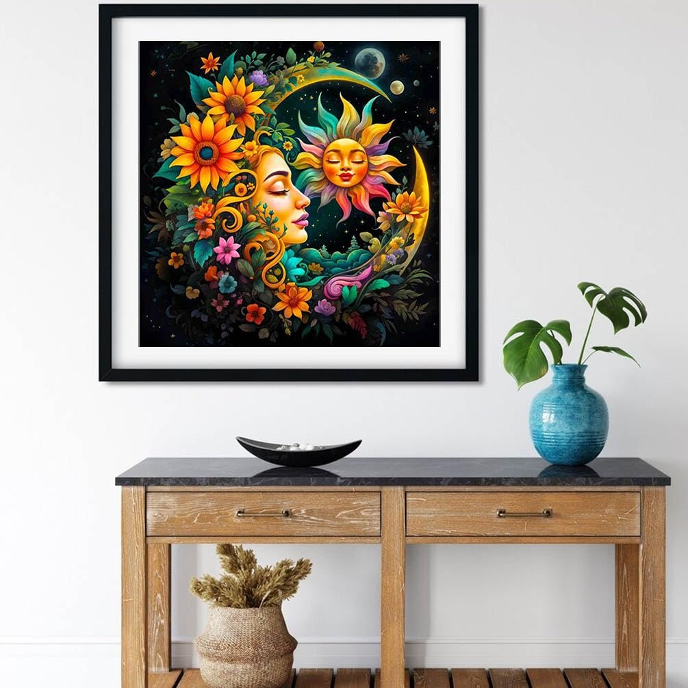 Framed diamond art painting of a woman's profile with sun and moon motifs, surrounded by flowers.