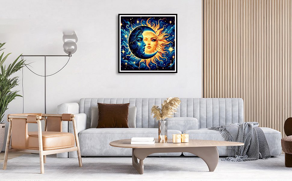 Framed sun and moon painting hanging above a sofa in a living room setting.
