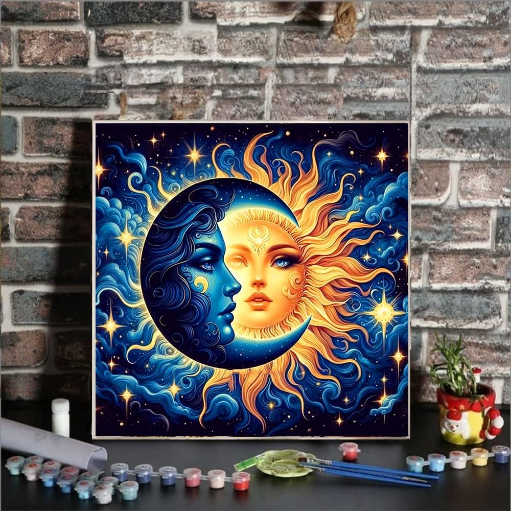 Paint by numbers kit featuring a celestial sun and moon design, with paints and brushes in the foreground.