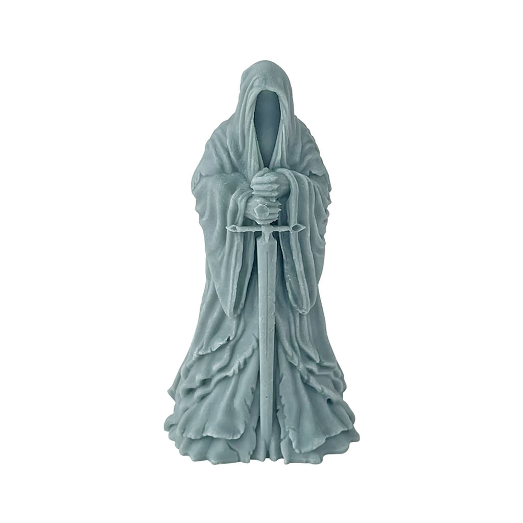 Silicone mold in the shape of a hooded figure holding a sword, isolated on a white background.