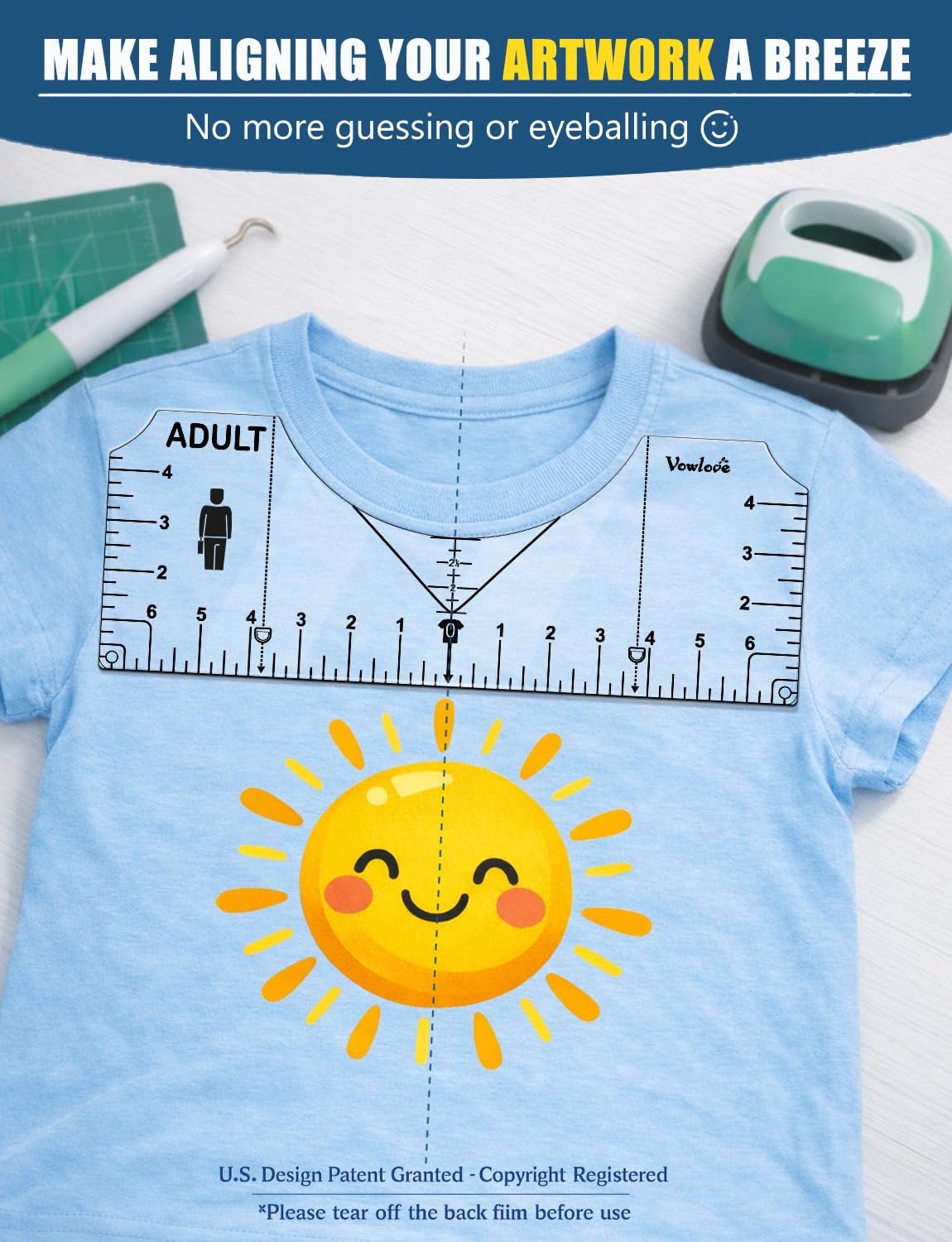 T-shirt ruler alignment tool on a light blue t-shirt with a sun graphic, showing measurements and adult sizing.