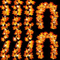 Autumn maple leaf garland with warm LED lights, displayed in vertical strands and arched shapes against a black background.