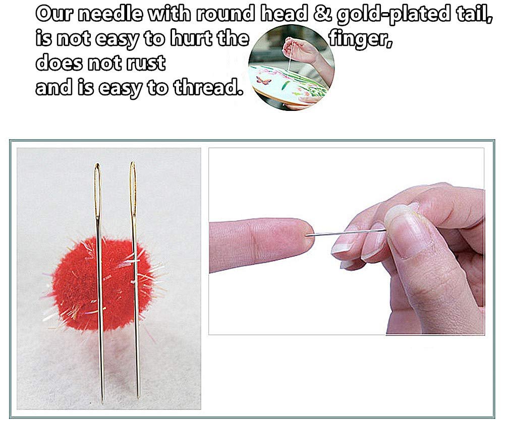 Two gold-plated sewing needles shown close-up, one being threaded by a finger.
