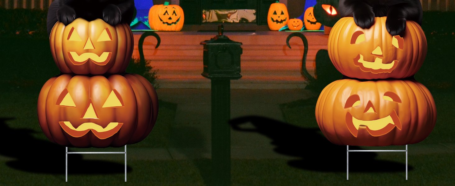 Two stacked black cat Halloween yard signs with glowing jack-o'-lantern faces and stakes on grass.