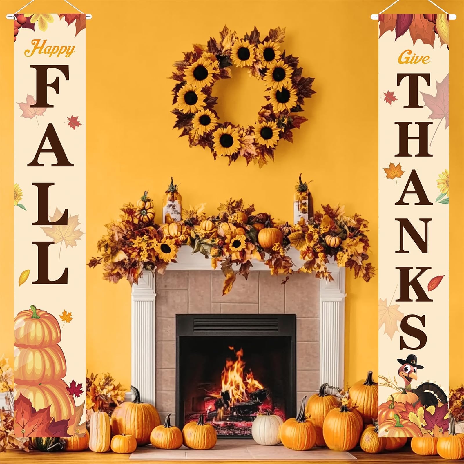 Two fall porch banners, one reading 'Happy FALL' and the other 'Give THANKS', displayed on a yellow wall above a fireplace decorated with pumpkins and sunflowers.