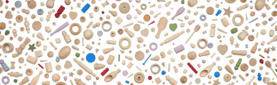 Assortment of unfinished wooden craft shapes including beads, hearts, stars, rolling pins, and spools on a white background.