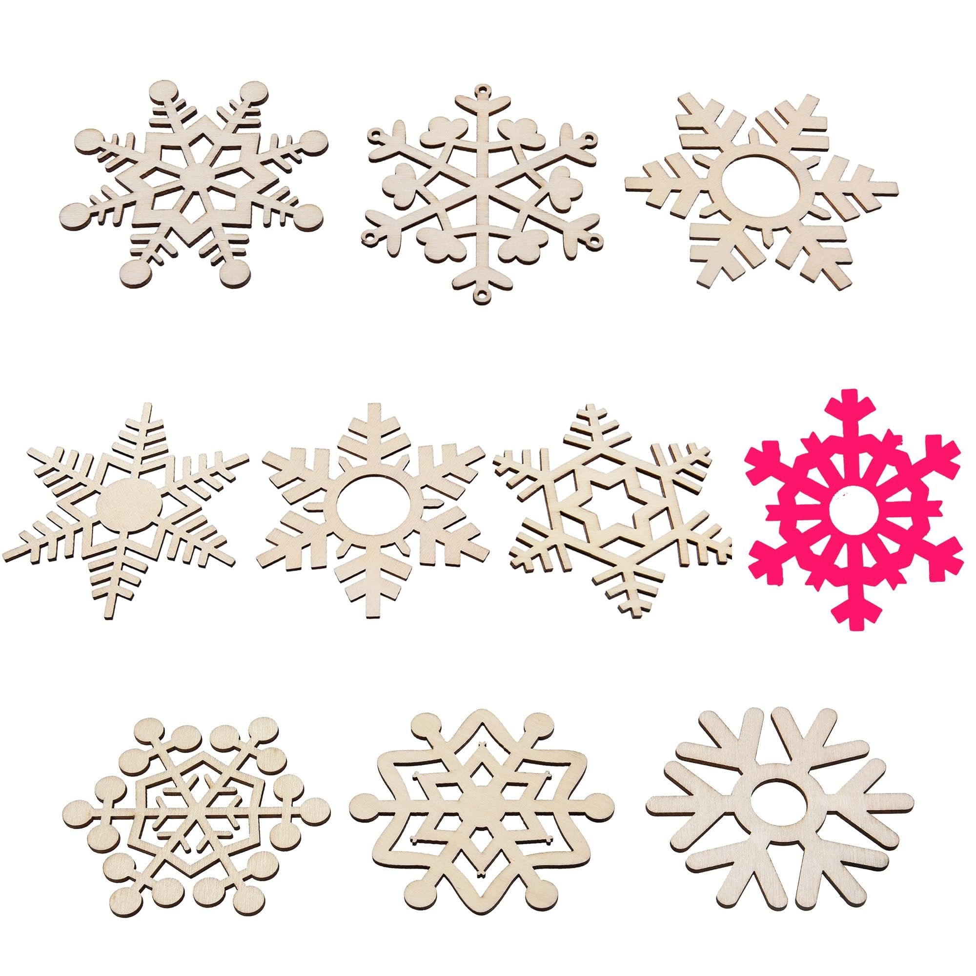 Nine assorted unfinished wooden snowflake cutouts, one bright pink snowflake cutout, on a white background.