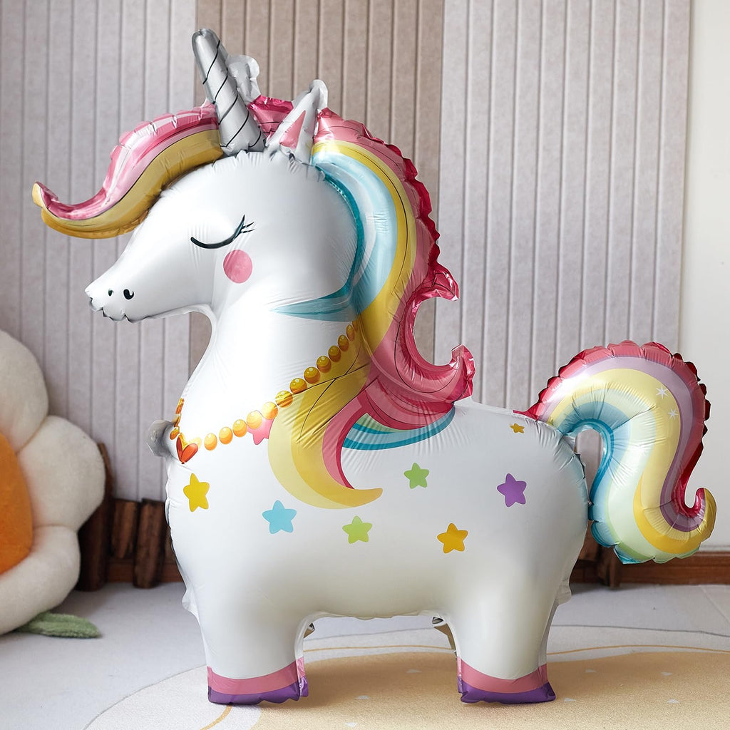 3D self-standing unicorn foil balloon with rainbow mane and tail, decorated with stars and a beaded necklace.