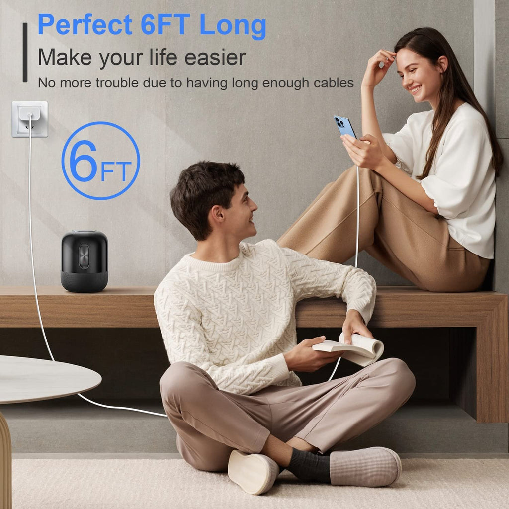 Couple using a white USB-C to Lightning cable to charge devices in a living room setting.