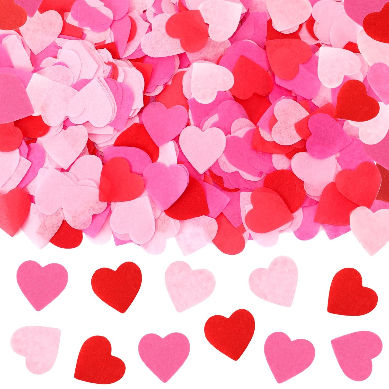 Scattered red, rose, and pink heart-shaped paper confetti on a white background, with a neat row of hearts at the bottom.