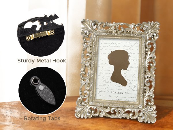 Ornate vintage 5x7 picture frame in antique gold with glass front, showing back details of hook and rotating tabs