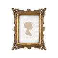 Vintage-style antique gold polyresin picture frame with ornate detailing and glass front, shown on a white background.