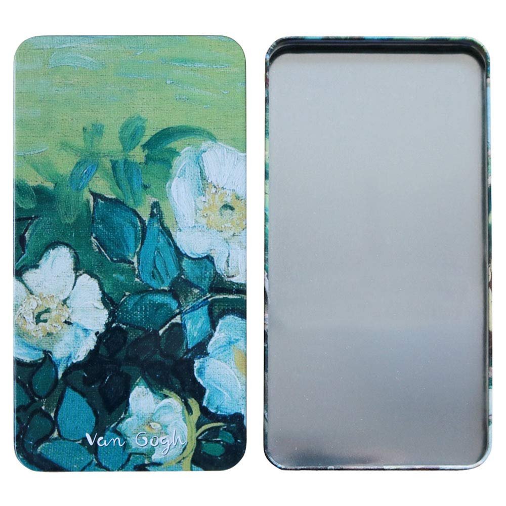 Watercolor palette tin box with floral painting and open interior, showing a mirrored surface.