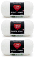 Three white acrylic yarn skeins with black labels showing brand and product details, arranged vertically.
