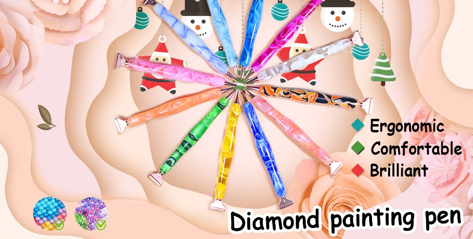Collection of colorful diamond painting pens arranged in a circular pattern with festive holiday decorations.
