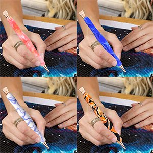 Four hands holding diamond painting pens in different colors, each working on a diamond art canvas.
