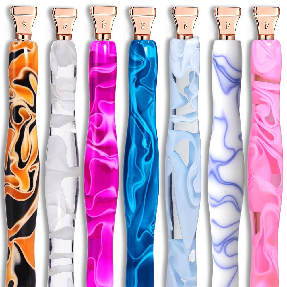 Set of seven diamond painting pens with rose gold tips and colorful marbled resin barrels, displayed in a row.