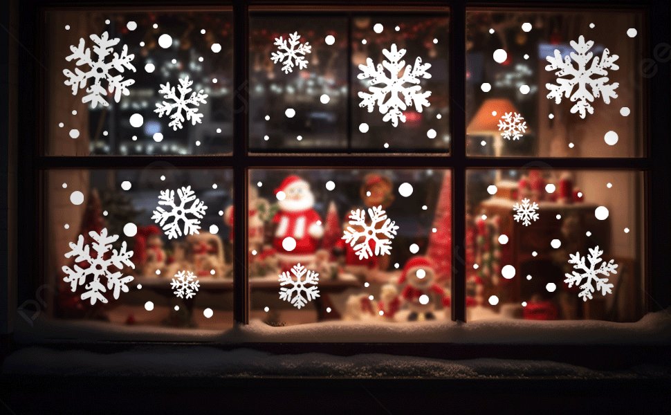 White snowflake and dot Christmas window clings applied to a window with a snowy sill and blurred holiday decorations inside.