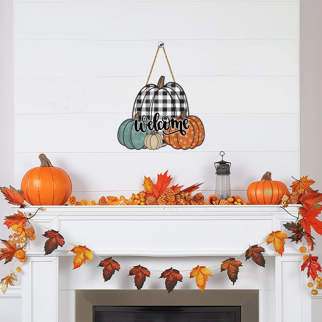 Wooden pumpkin welcome sign with buffalo plaid and fall leaves hanging above a decorated mantelpiece.