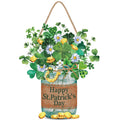 St. Patrick's Day hanging sign shaped like a jar with shamrocks, daisies, gold coins, and a horseshoe.
