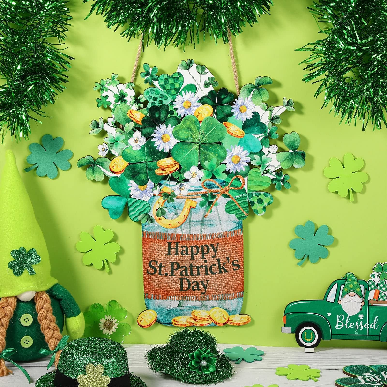 St. Patrick's Day hanging sign with shamrocks, daisies, and coins, next to a gnome and a truck.