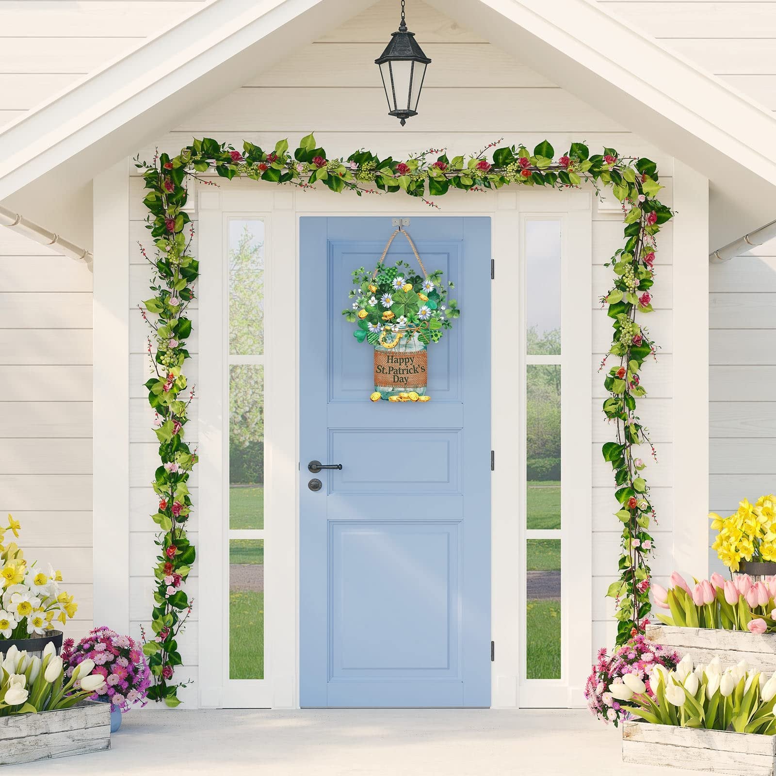 Wooden St. Patrick's Day hanging sign with shamrocks and flowers, on a blue door with floral garlands.