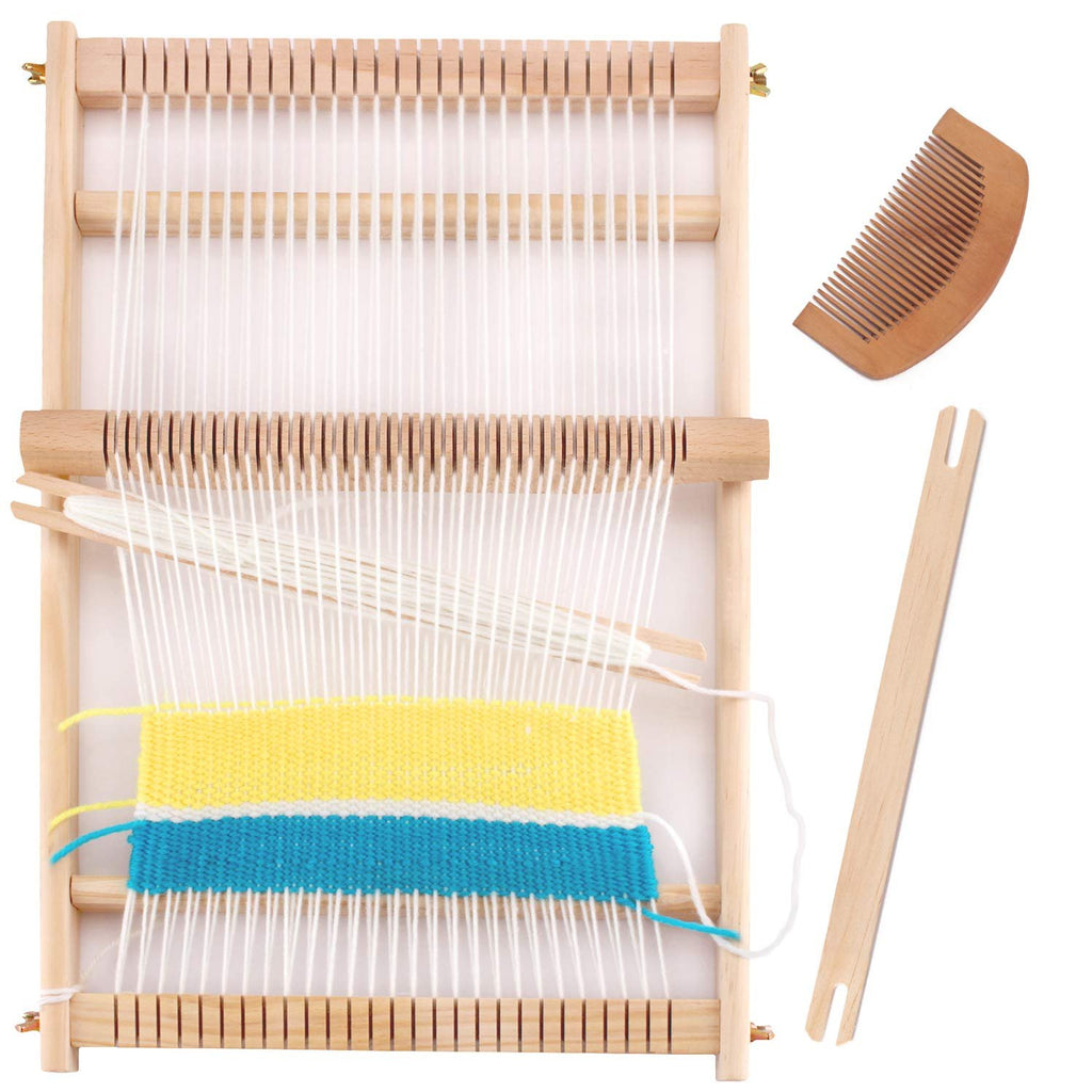 Wooden weaving loom kit with partially woven yellow and blue tapestry, includes comb and shuttle, isolated on white.